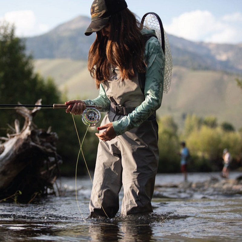 a woman is fishing